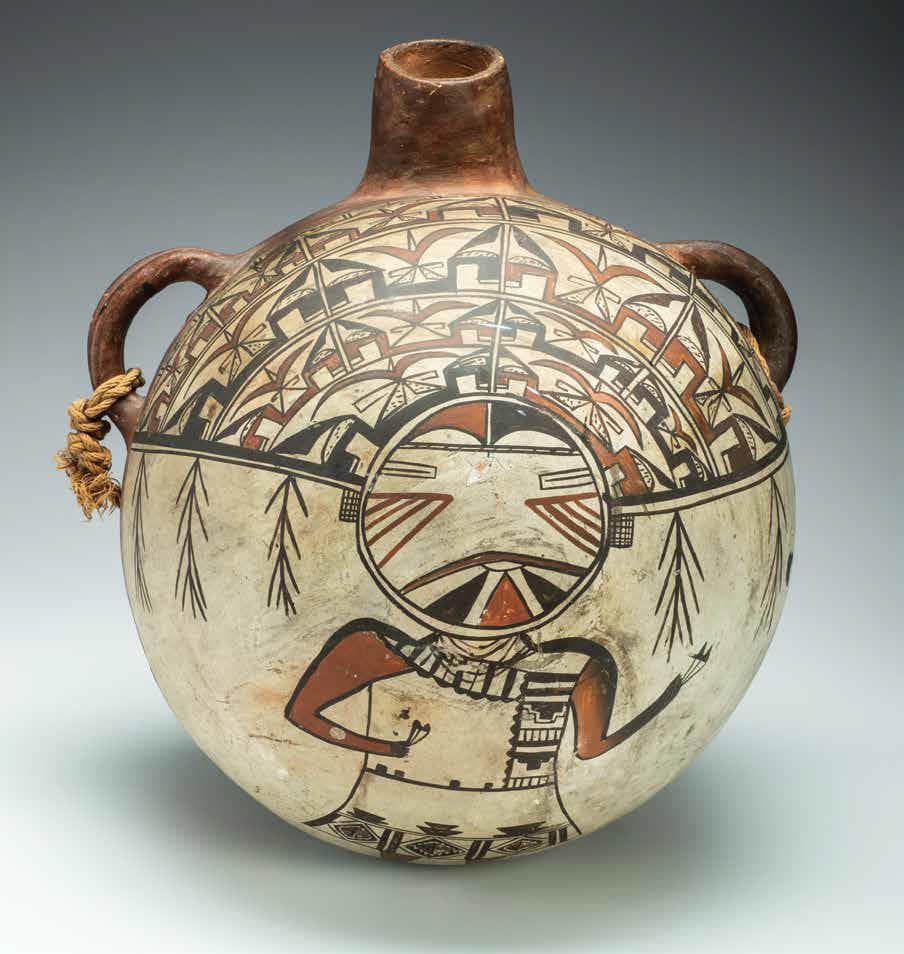 Ancient painted ceramic pot with geometric designs.
